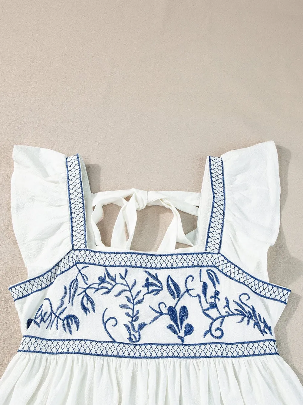 Alluring White Embroidered Top